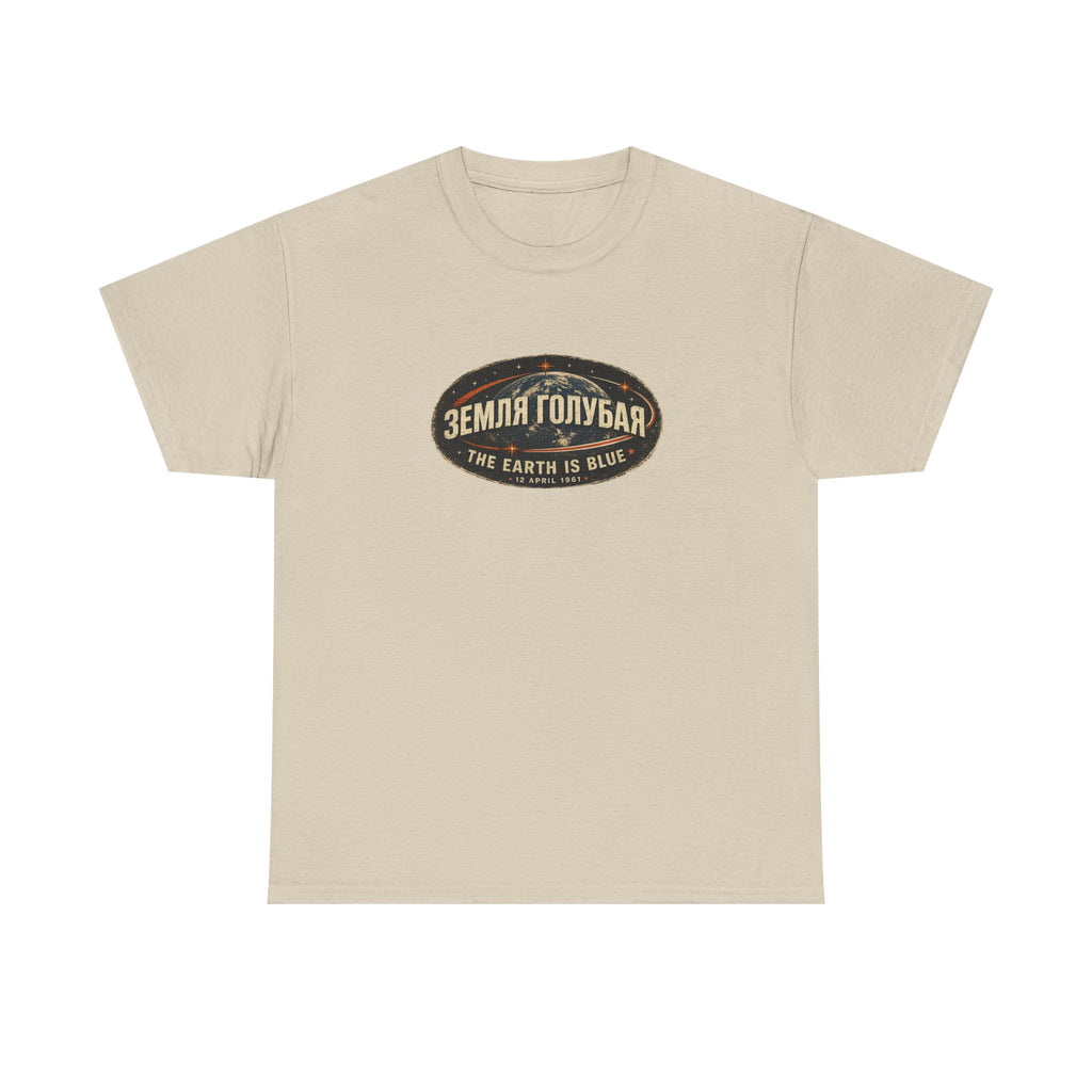 Front of a sand Gildan 5000 T-shirt featuring the The Earth Is Blue design with the Russian phrase "ЗЕМЛЯ ГОЛУБАЯ" above Earth and the English translation below. by RIOTTEES