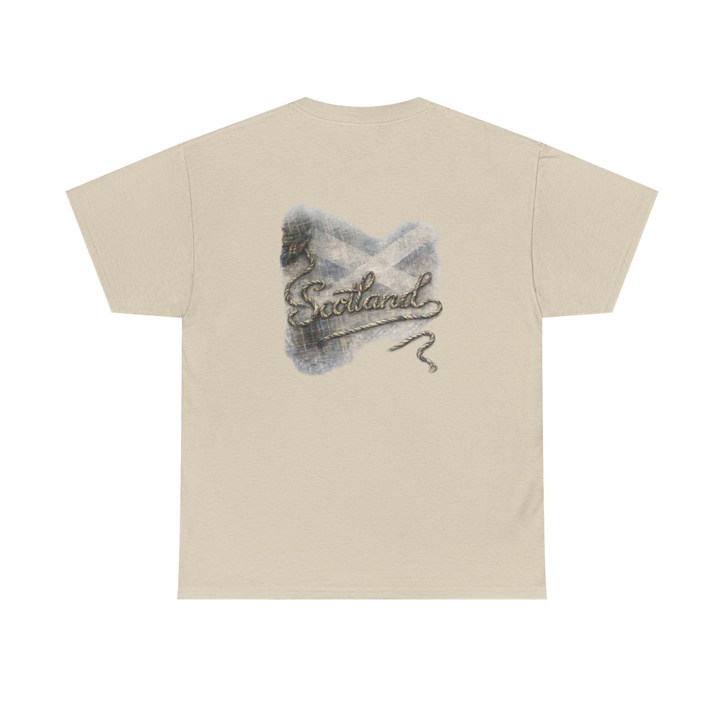 Sand Scottish Yarn t-shirt floating above a peaceful Scottish loch, featuring the back design with Saltire, tartan and woven Scotland artwork by RIOTTEES.