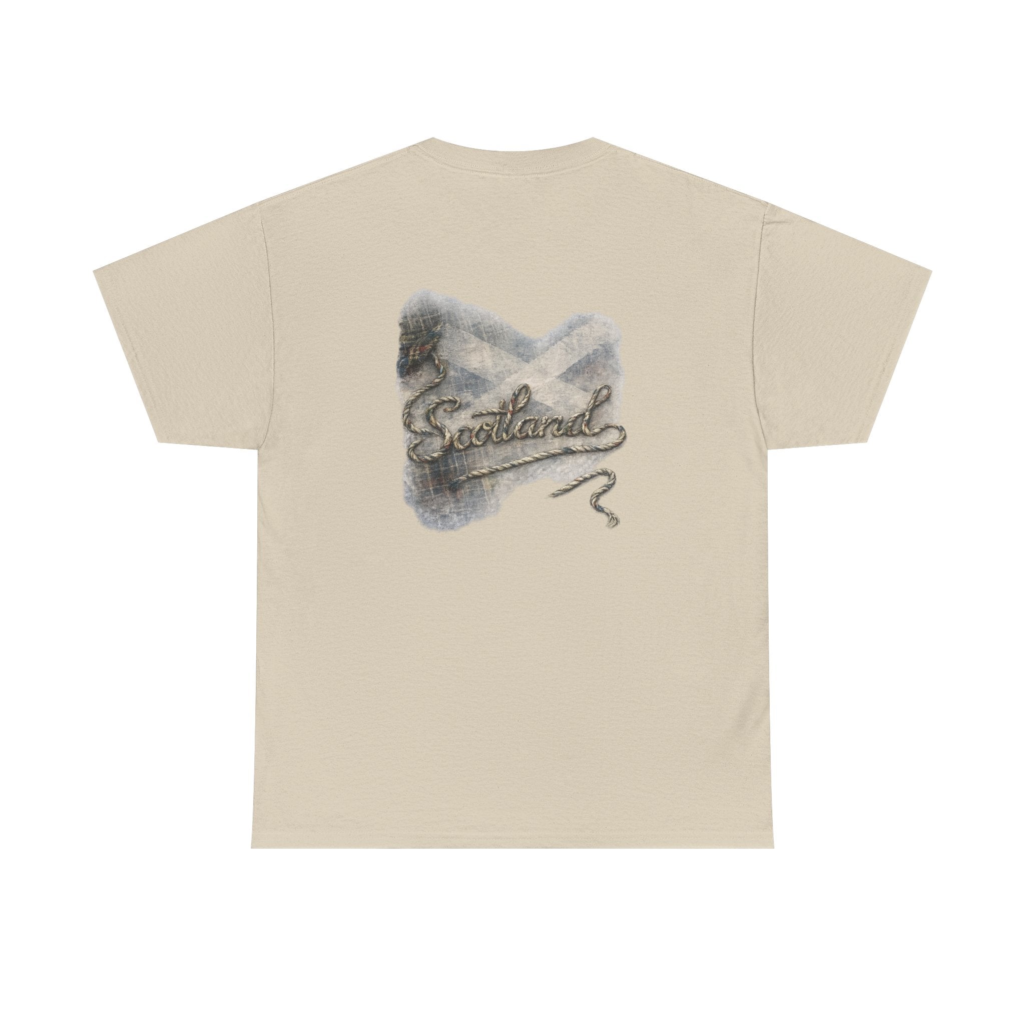 Sand Scottish Yarn t-shirt floating above a peaceful Scottish loch, featuring the back design with Saltire, tartan and woven Scotland artwork by RIOTTEES.