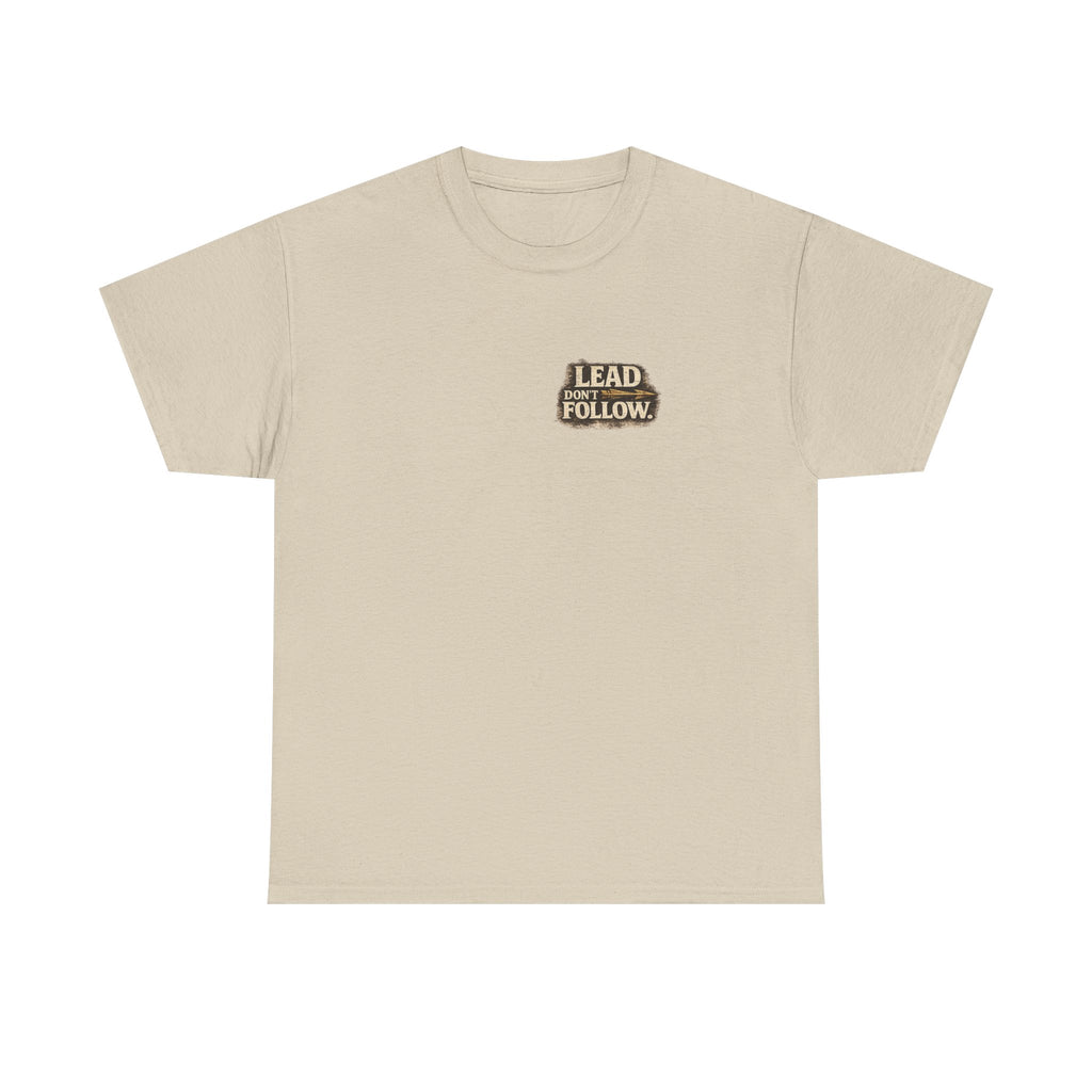 The front of the Not All Norths Are True T-shirt in Sand, featuring distressed "LEAD DON'T FOLLOW" typography with a vintage arrow by RIOTTEES.