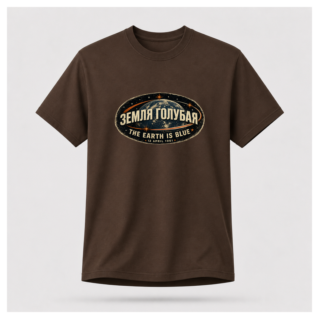 Front of a floating chocolate brown male-form Gildan 5000 T-shirt featuring the The Earth Is Blue design with the Russian phrase "ЗЕМЛЯ ГОЛУБАЯ" above Earth and the English translation below. by RIOTTEES
