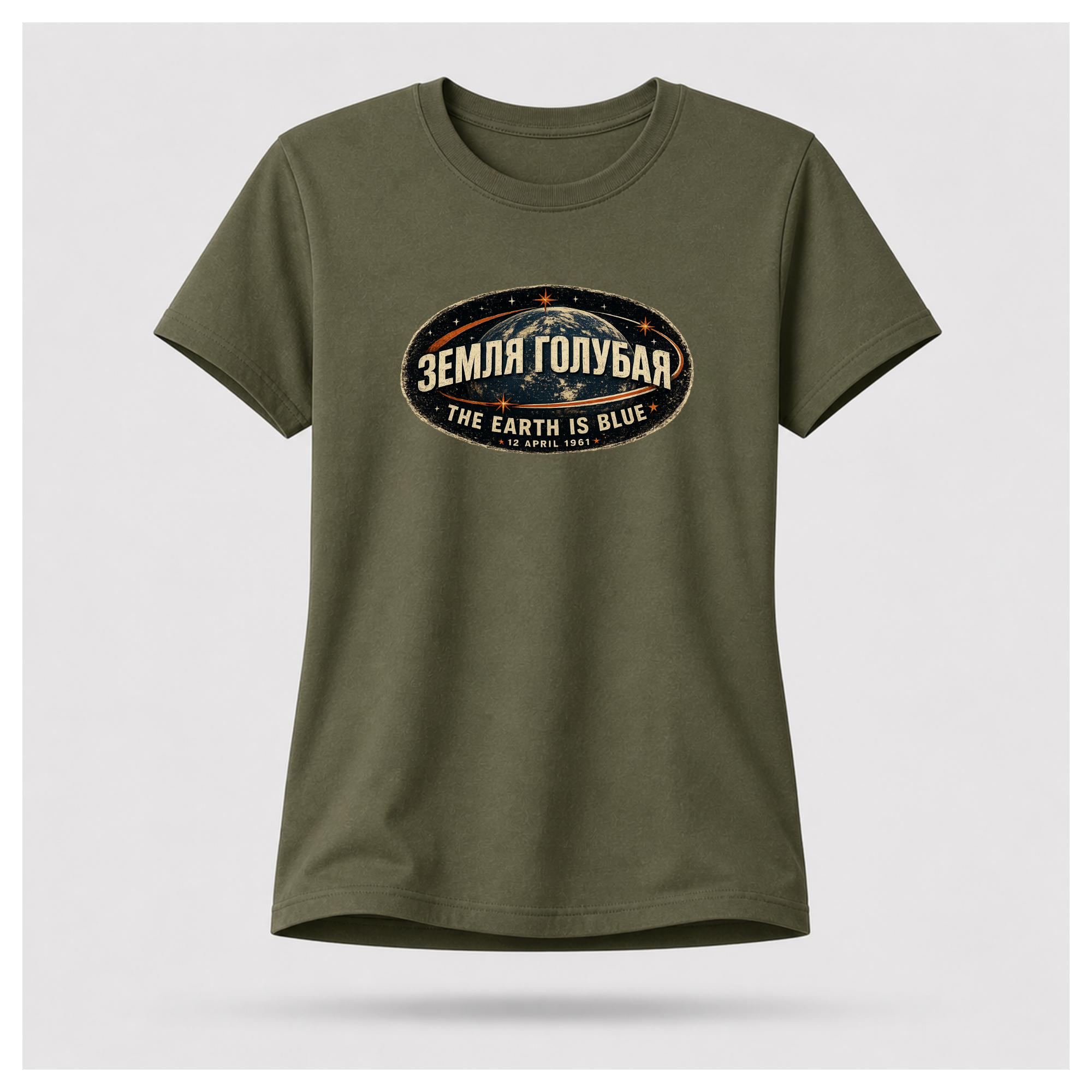 Front of a floating military green female-form Gildan 5000 T-shirt featuring the The Earth Is Blue design with the Russian phrase "ЗЕМЛЯ ГОЛУБАЯ" above Earth and the English translation below. by RIOTTEES