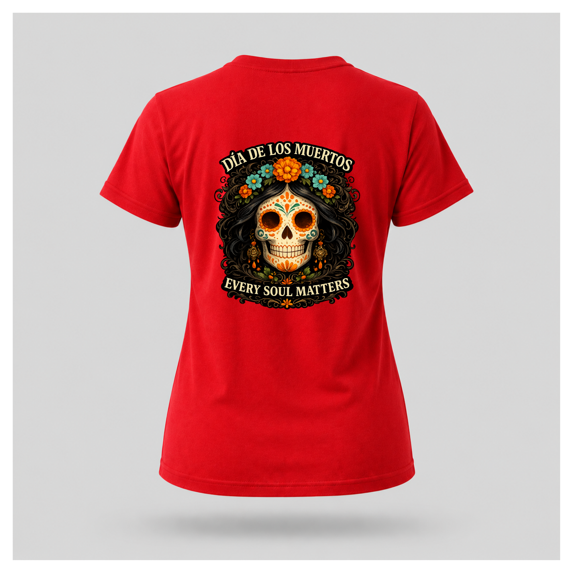 Floating red Every Soul Matters – Día de los Muertos t-shirt by RIOTTEES in a feminine tee shape with the large sugar skull artwork printed on the back.