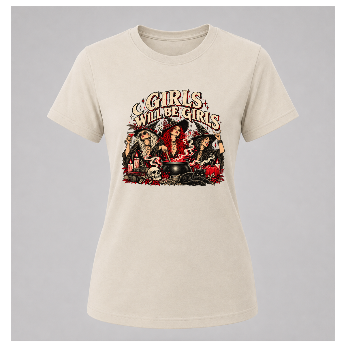 Girls Will Be Girls Tee in sand, floating female T-shirt mockup displaying three witches around a cauldron with vintage cream and red artwork.