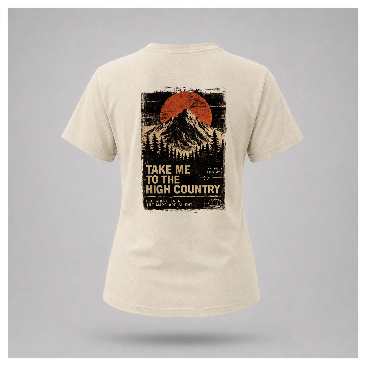 Sand female form floating tee, back view, featuring the Go Where The Maps Are Silent mountain design with “Take Me To The High Country” and “I Go Where, Even The Maps Are Silent” text by RIOTTEES.