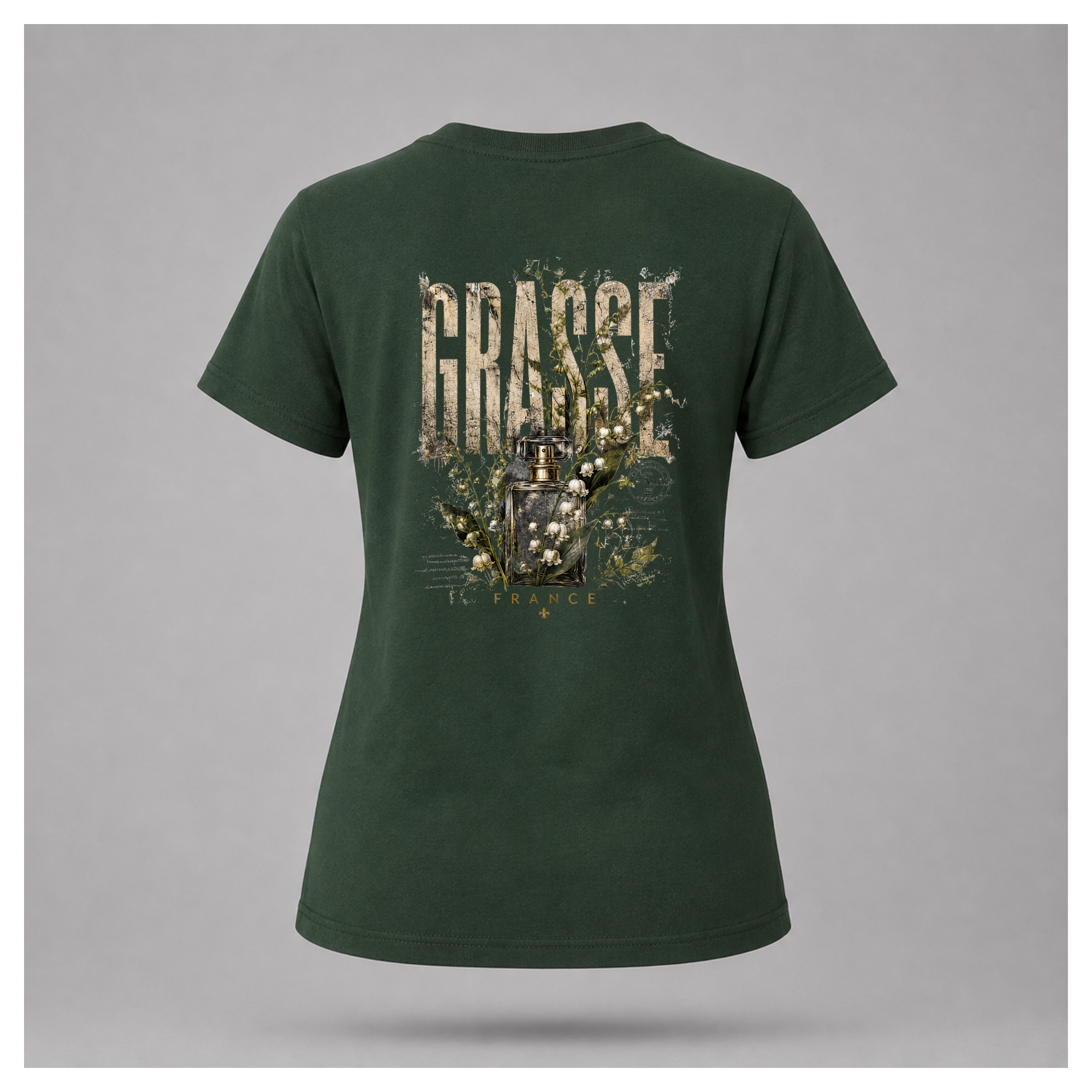 Forest green Grasse Parfum Apothecary T-shirt on a floating female form, featuring the large vintage botanical fragrance bottle back design by RIOTTEES.