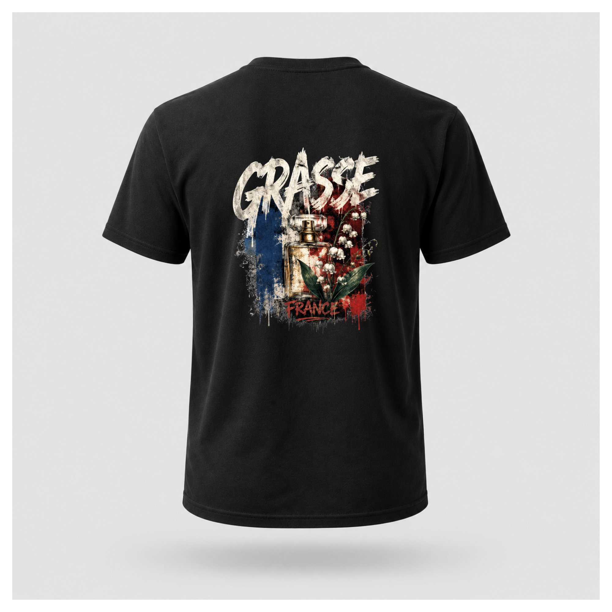 Floating male form wearing the Black Gildan 5000 Grasse Street Code T-shirt showing the BACK design featuring distressed Grasse typography, vintage perfume bottle and lily of the valley artwork inspired by the fragrance capital of France by RIOTTEES.