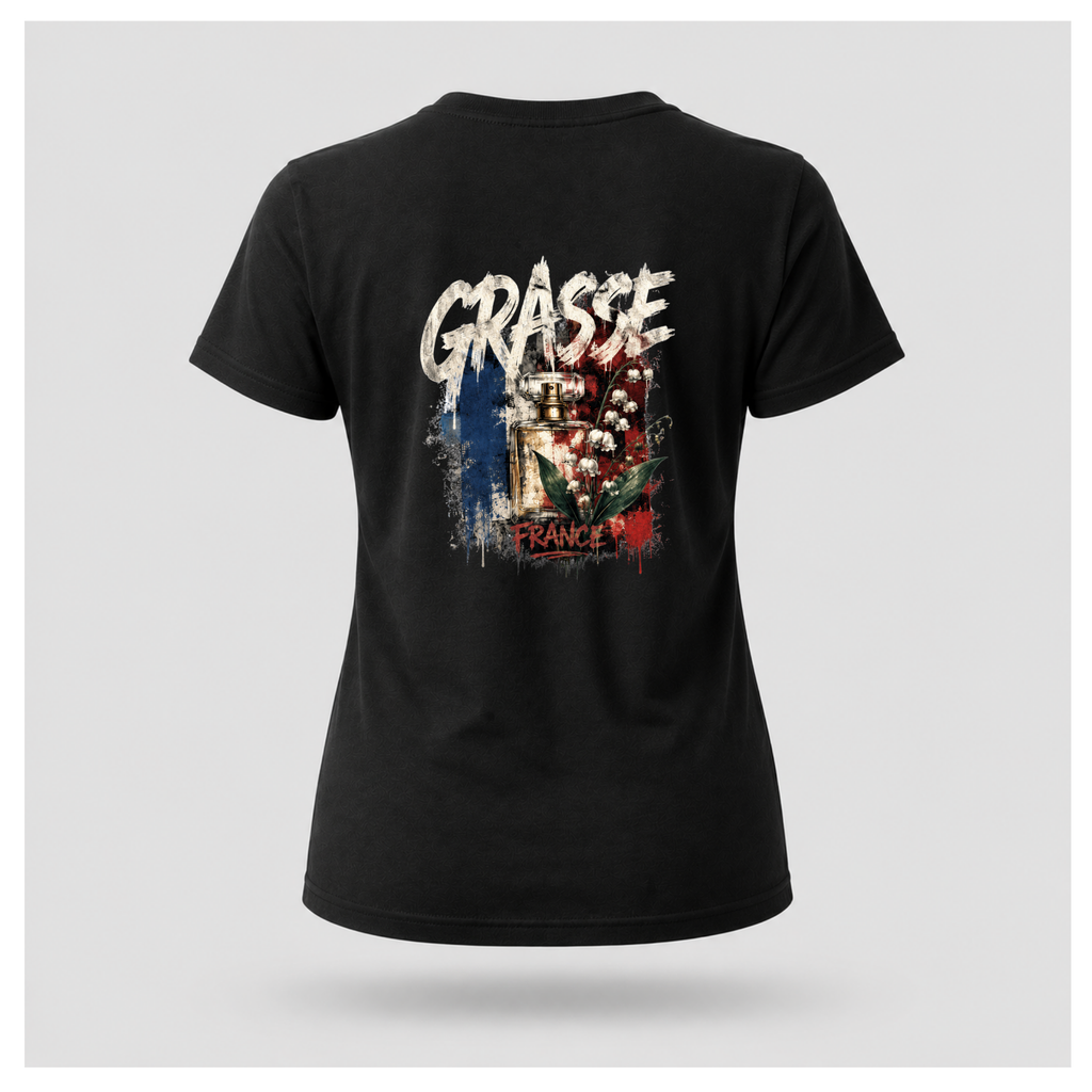Floating female form wearing the Black Gildan 5000 Grasse Street Code T-shirt showing the BACK design featuring distressed Grasse typography, vintage perfume bottle and lily of the valley artwork inspired by the fragrance capital of France by RIOTTEES.