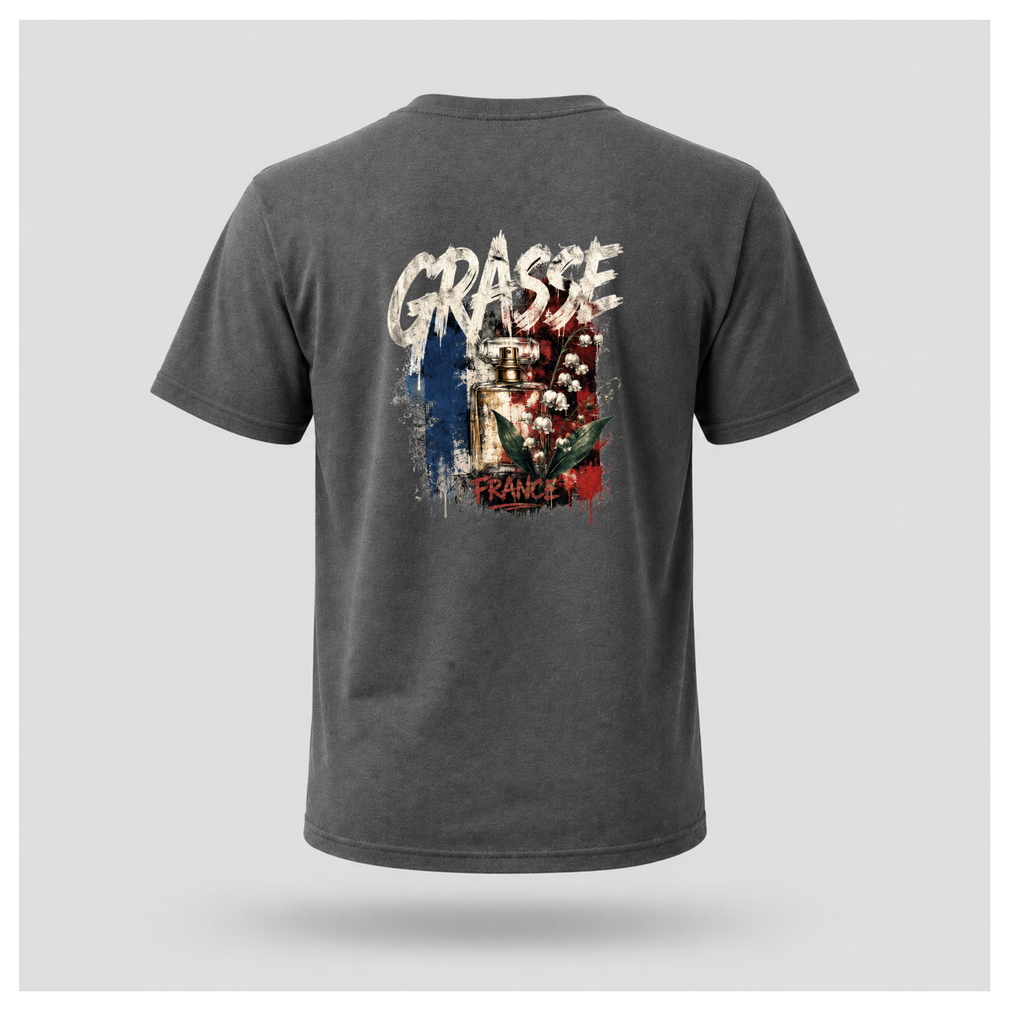 Floating male form wearing the Charcoal Grey Gildan 5000 Grasse Street Code T-shirt showing the BACK design featuring distressed Grasse typography, vintage perfume bottle and lily of the valley artwork inspired by the fragrance capital of France by RIOTTEES.
