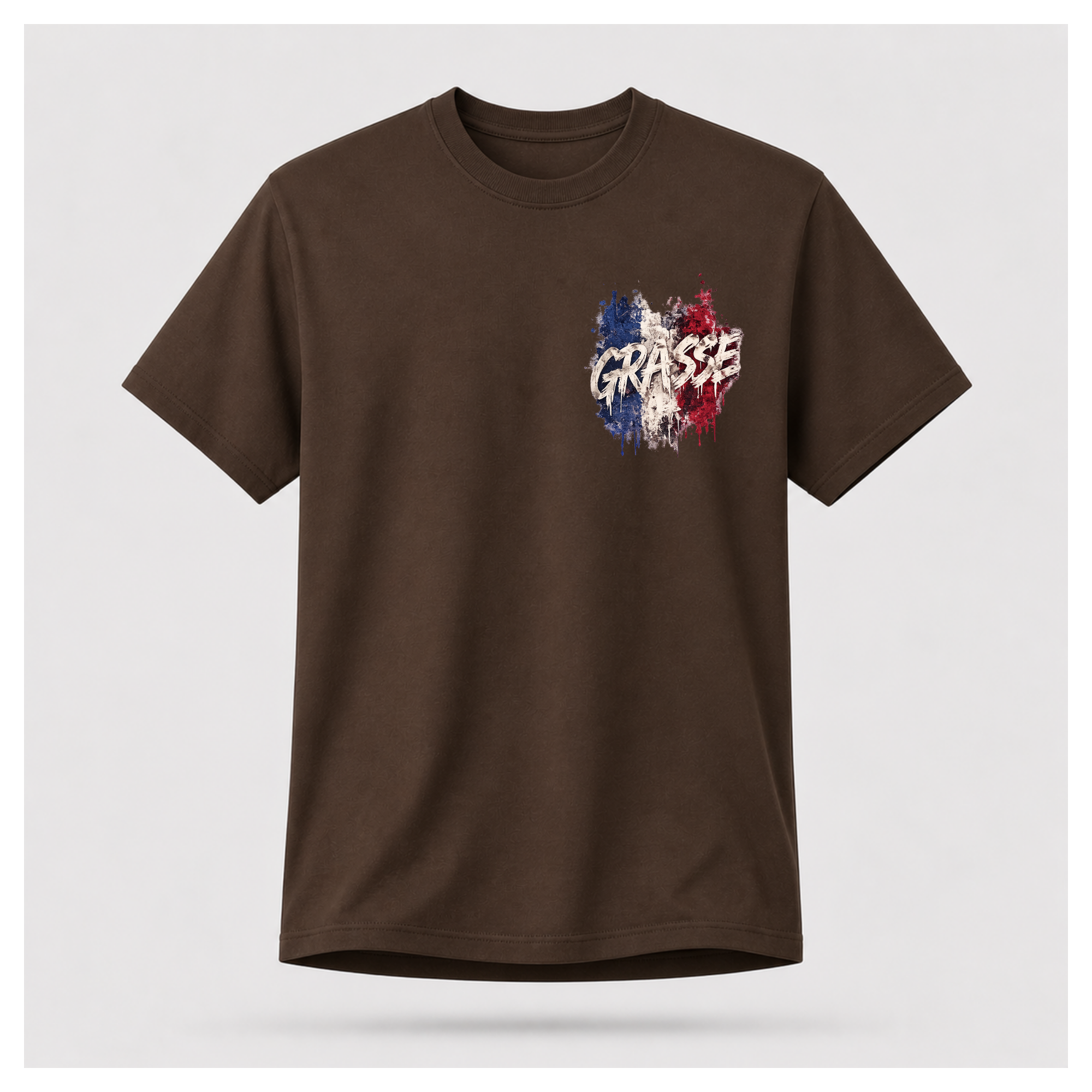 Floating male form wearing the Chocolate Brown Gildan 5000 Grasse Street Code T-shirt showing the FRONT with the Grasse pocket print inspired by the fragrance capital of France by RIOTTEES.