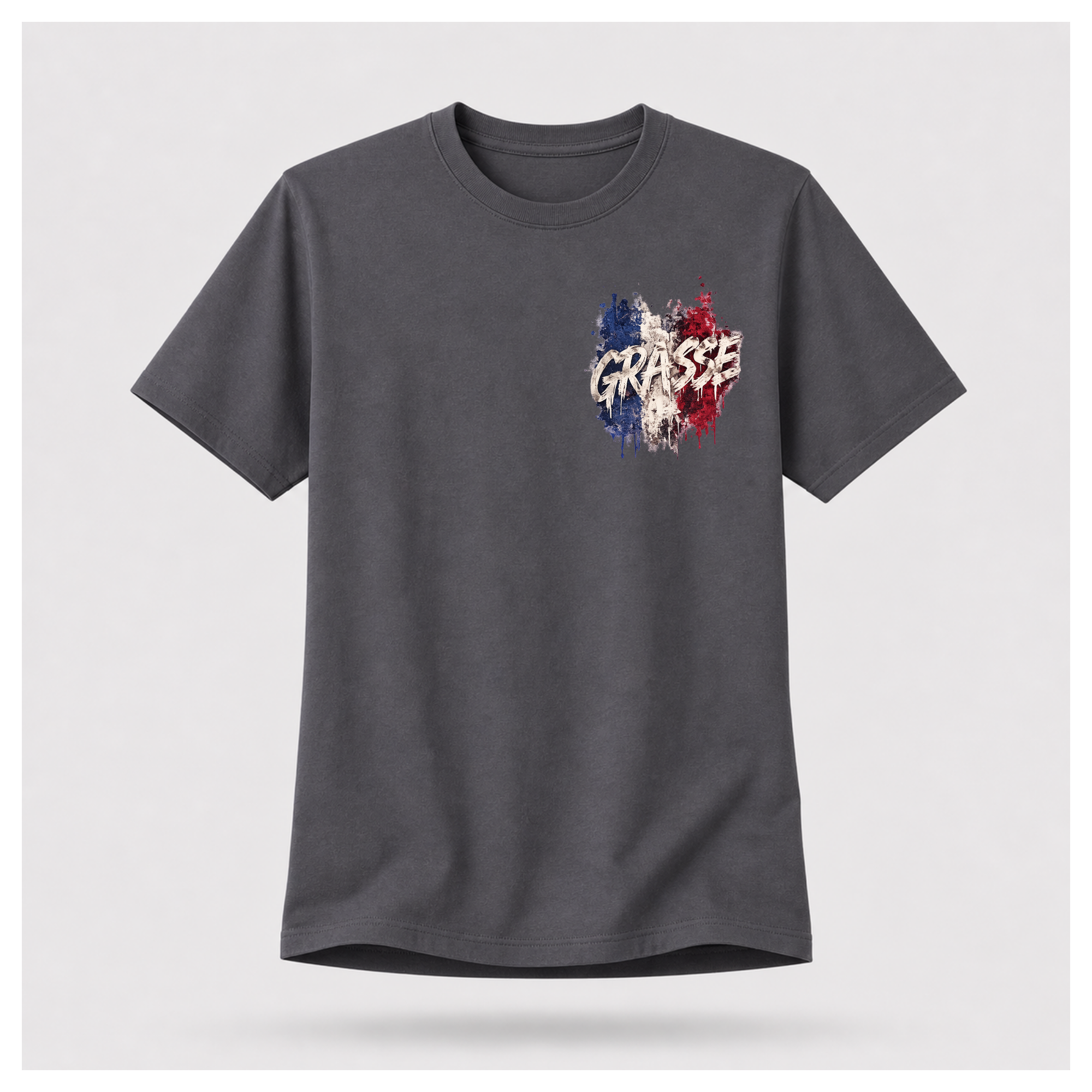 Floating male form wearing the Charcoal Grey Gildan 5000 Grasse Street Code T-shirt showing the FRONT with the Grasse pocket print inspired by the fragrance capital of France by RIOTTEES.