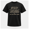 Black Guy Fawkes t-shirt by RIOTTEES shown on a male floating form, printed with a cream vintage engraving of the Gunpowder Plot conspirators and the words "Remember when the government said Catholics were extremists? No? See Guy Fawkes Night."