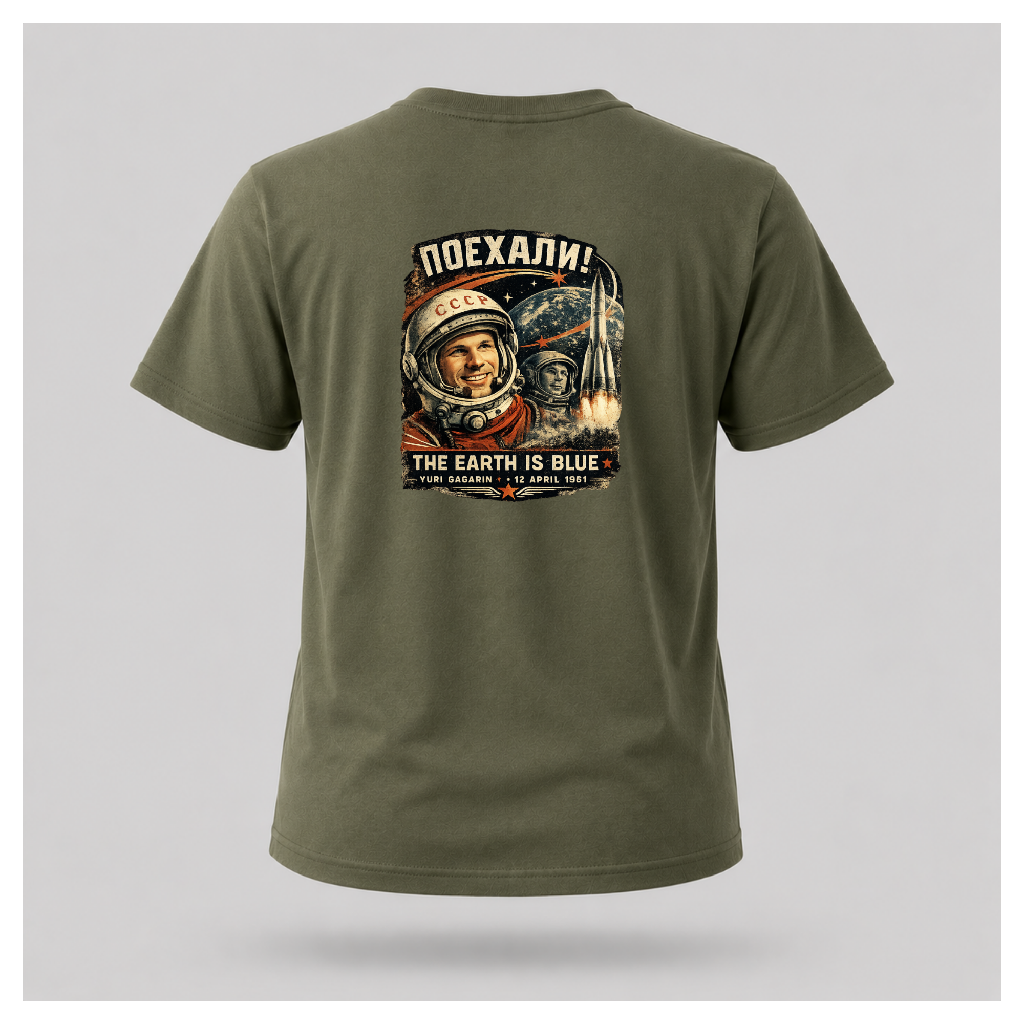 Military Green Let's Go! Yuri Gagarin T-shirt back displayed on a floating male-shaped figure, featuring the full vintage-inspired space exploration design by RIOTTEES.