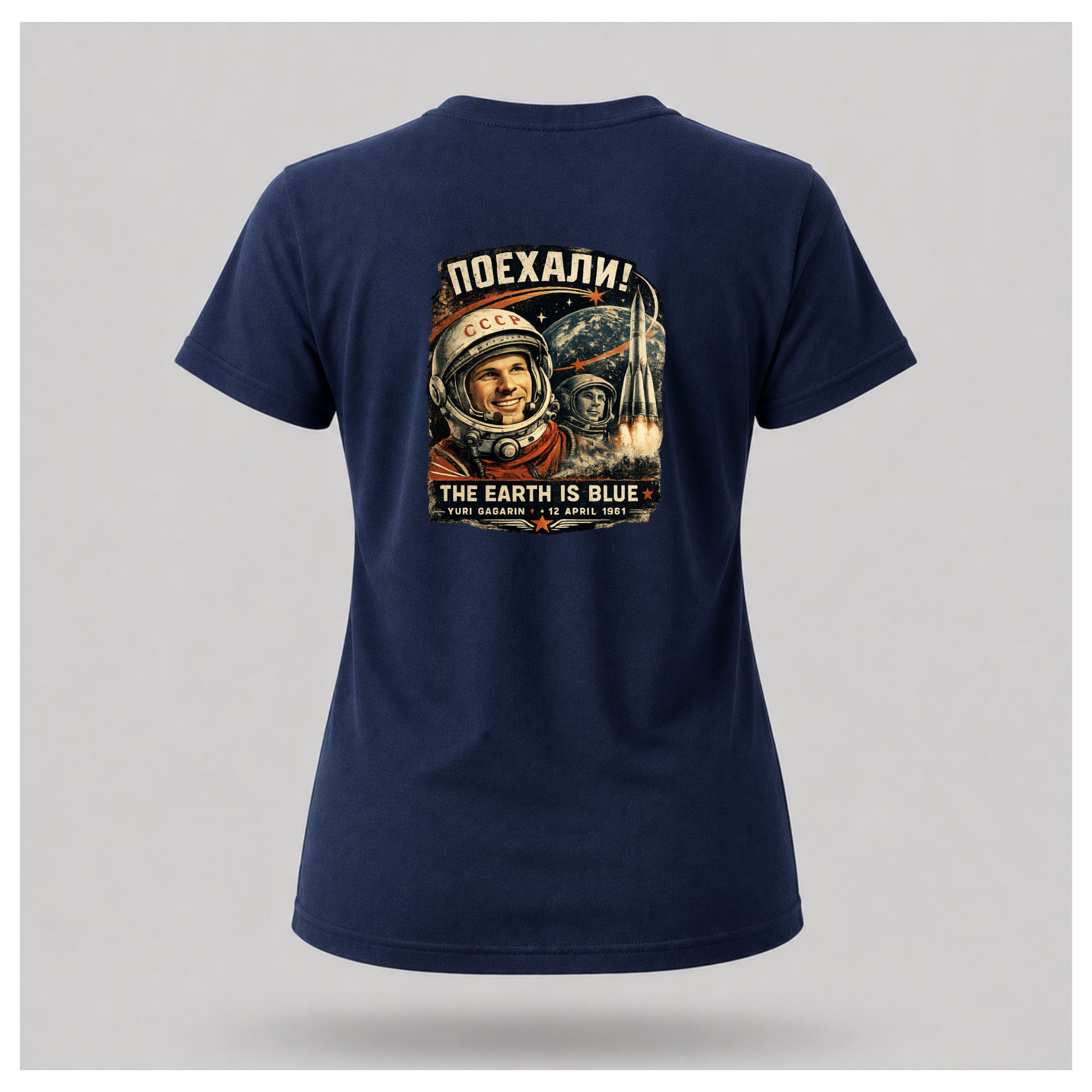 Navy Blue Let's Go! Yuri Gagarin T-shirt back displayed on a floating female-shaped figure, featuring the full vintage-inspired space exploration design by RIOTTEES.