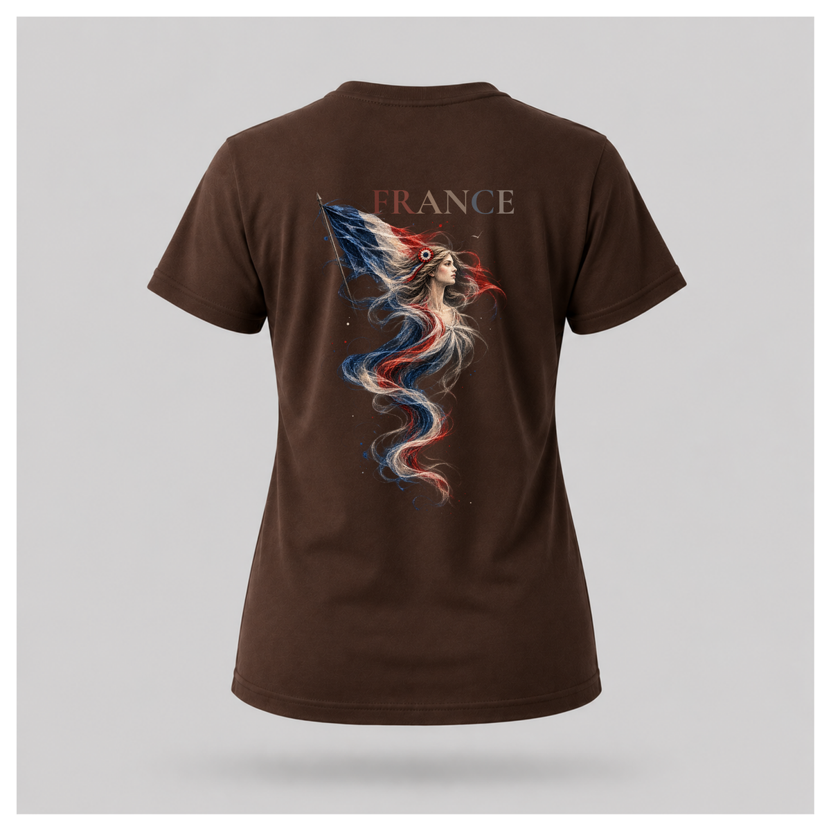 Female form floating chocolate brown Marianne — France T-shirt, back view, featuring large Marianne artwork in French tricolour tones with FRANCE above, by RIOTTEES.