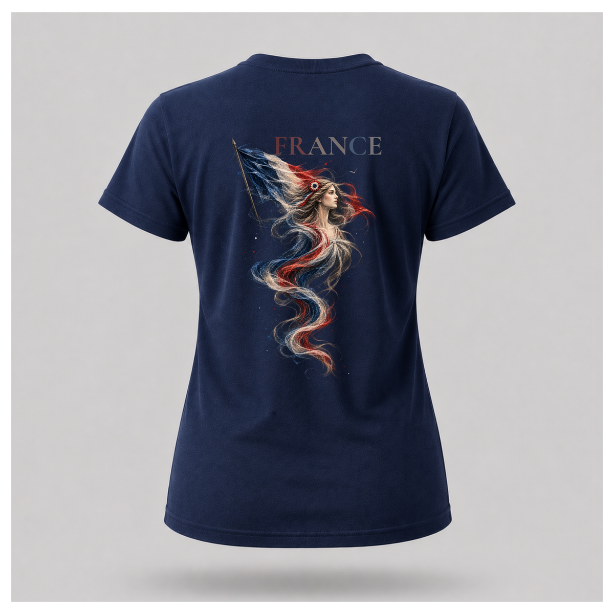 Female form floating navy blue Marianne — France T-shirt, back view, featuring large Marianne artwork in French tricolour tones with FRANCE above, by RIOTTEES.