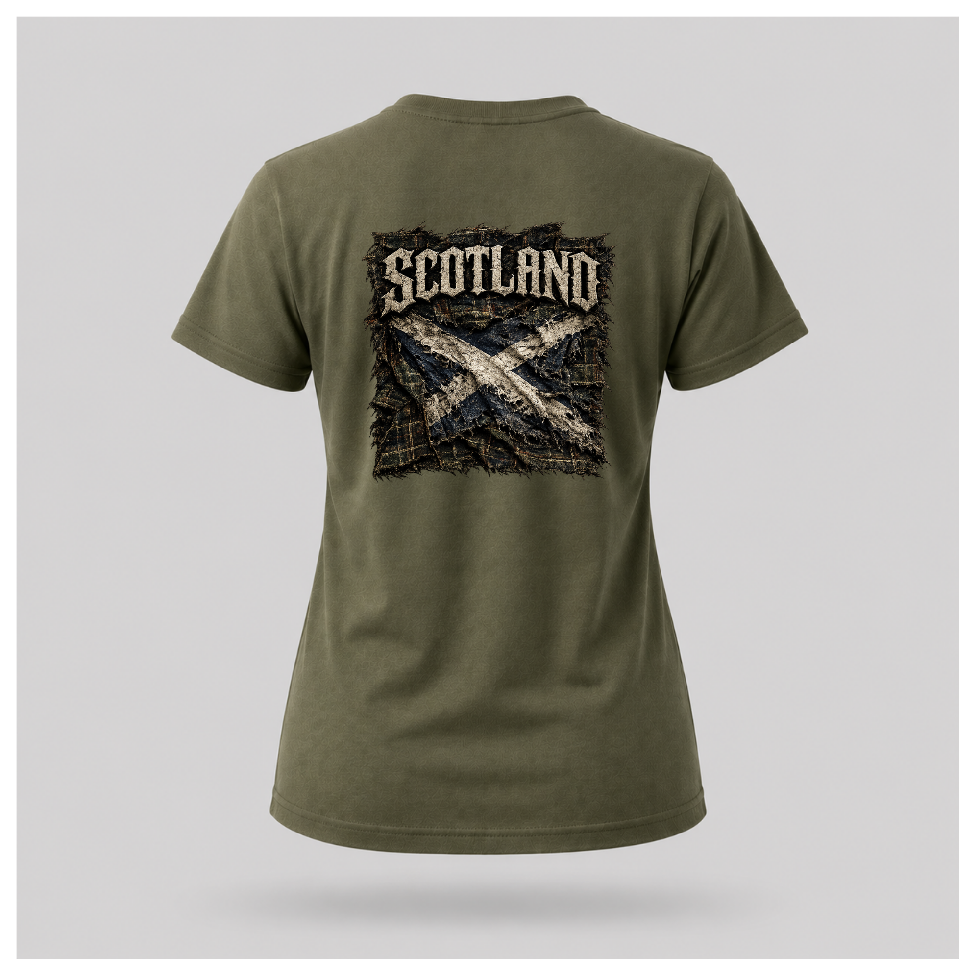 Female model wearing a military green Gildan 5000 t-shirt featuring the Modern Scotland design on the back with distressed Scotland lettering above a weathered Saltire layered over tartan, by RIOTTEES.