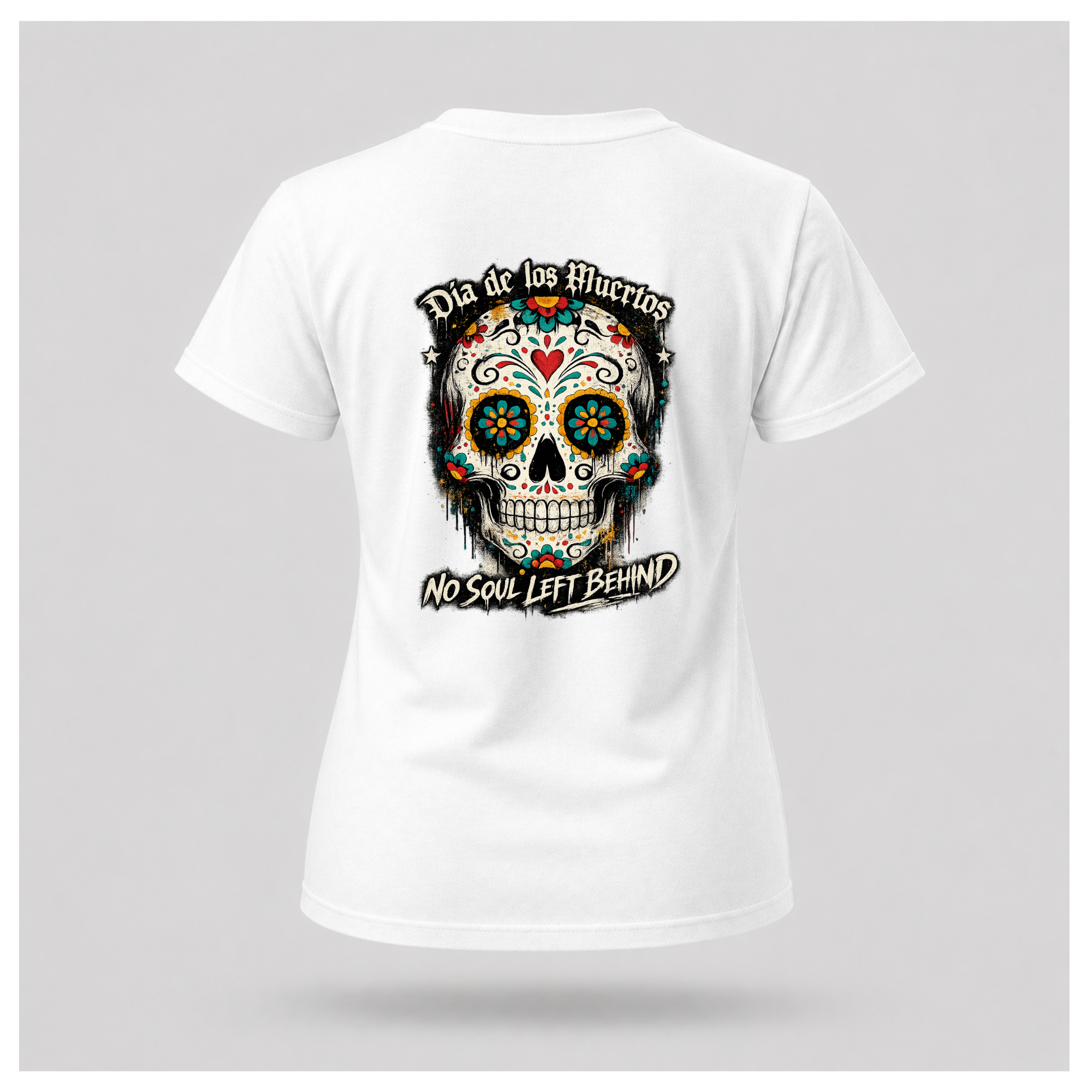 Floating women's t-shirt in white featuring a large colourful Día de los Muertos sugar skull surrounded by vibrant floral artwork, with "Día de los Muertos" above and "No Soul Left Behind" below, by RIOTTEES.