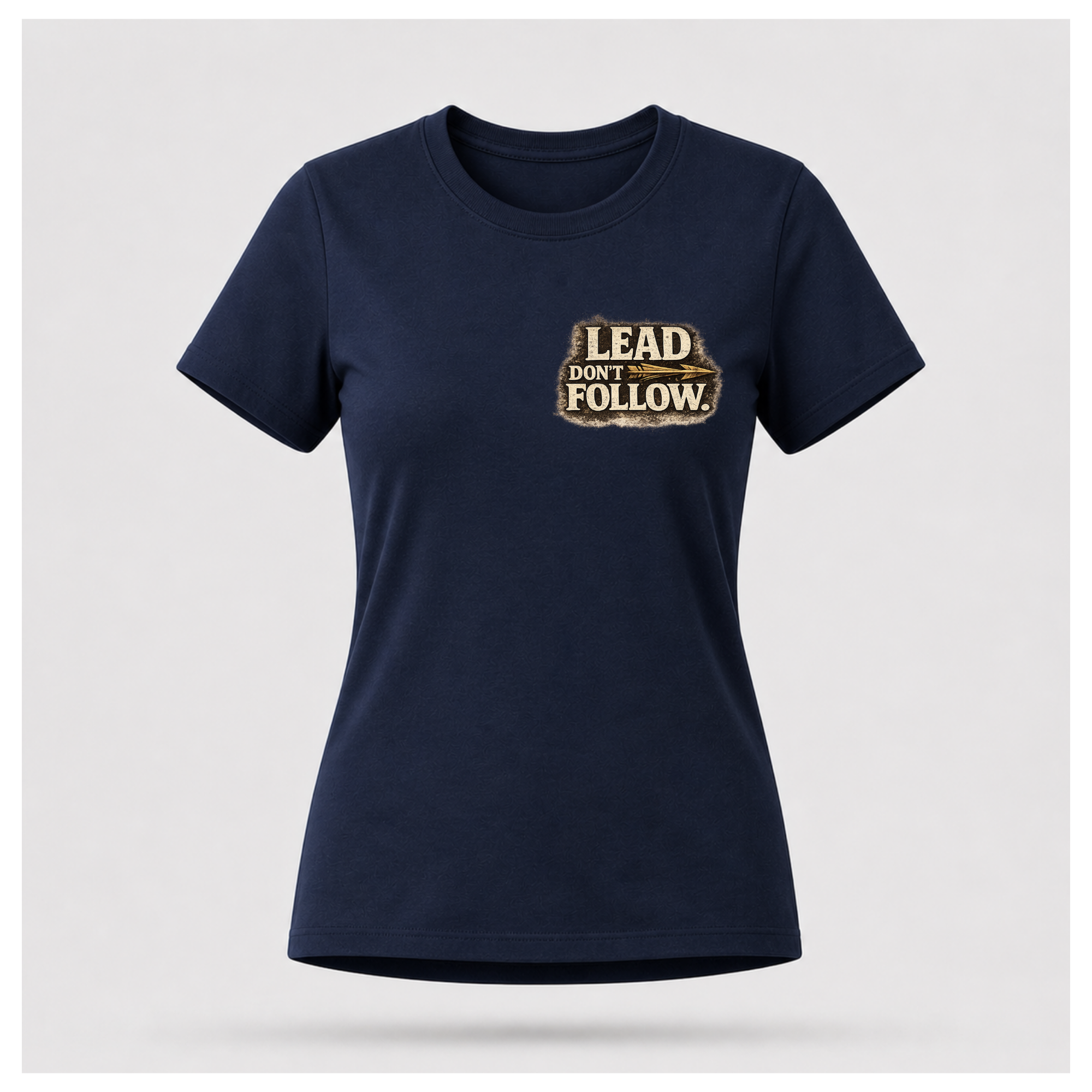 Floating female form wearing the front of the Not All Norths Are True T-shirt in Navy Blue, featuring distressed "LEAD DON'T FOLLOW" typography with a vintage arrow by RIOTTEES.