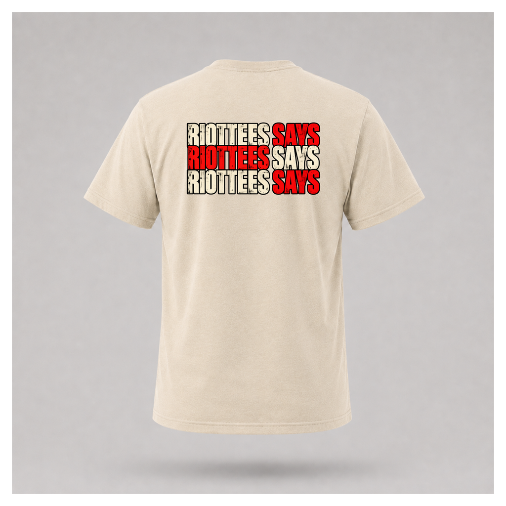 Men's sand RIOTTEES T-shirt featuring a distressed three-line RIOTTEES SAYS design in red and off-white lettering with black outlines.