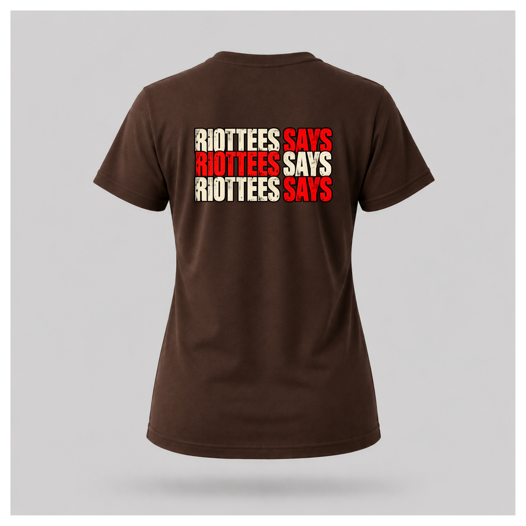 Women's chocolate brown RIOTTEES tee featuring repeated RIOTTEES SAYS typography in alternating distressed red and off-white lettering.