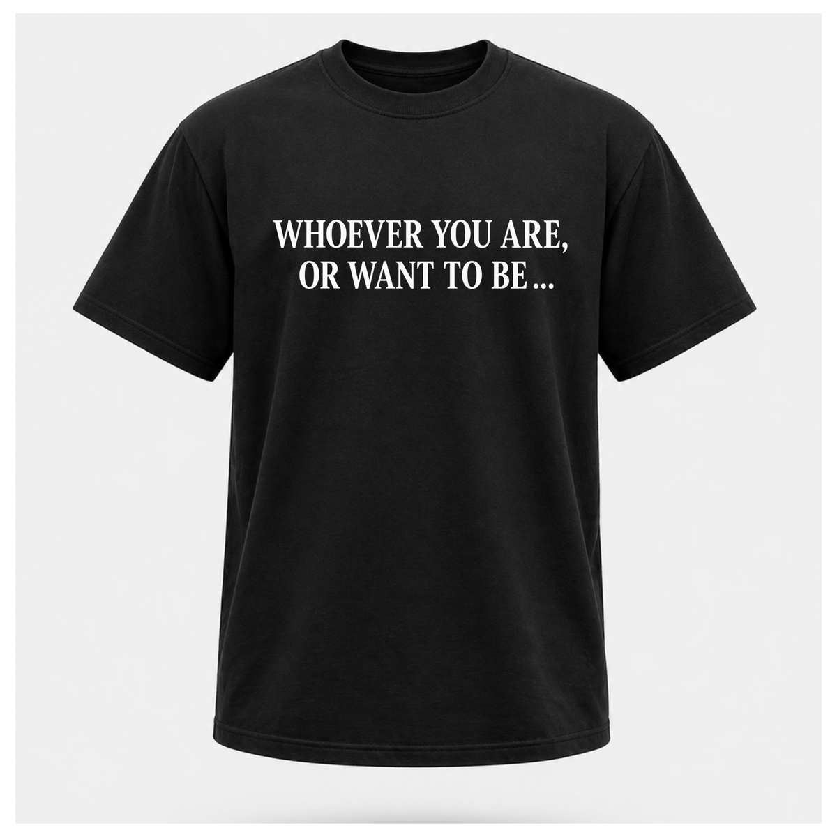 Male model wearing a black Politics Is Interested In You T-shirt with distressed white front text reading “Whoever you are, or want to be...”