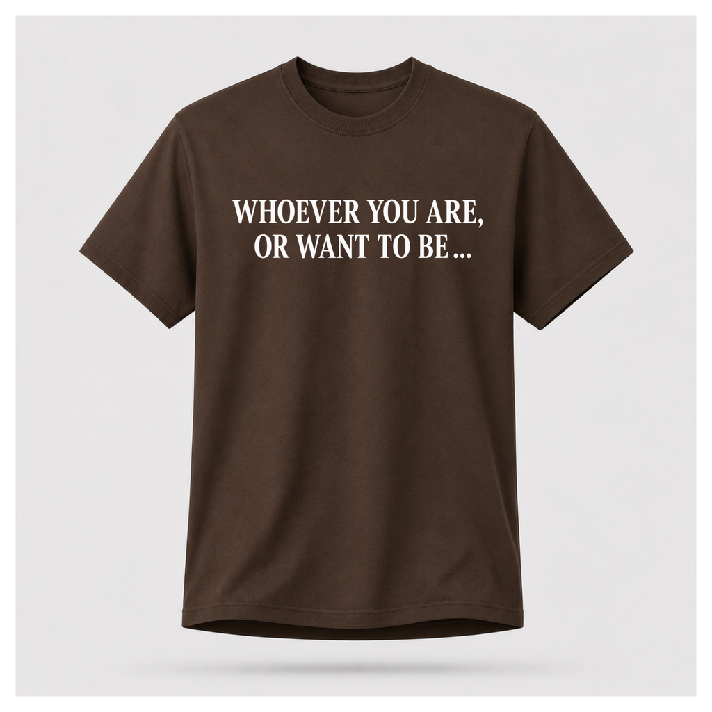Male model wearing a chocolate brown Politics Is Interested In You T-shirt with distressed white opening quote text on the front.