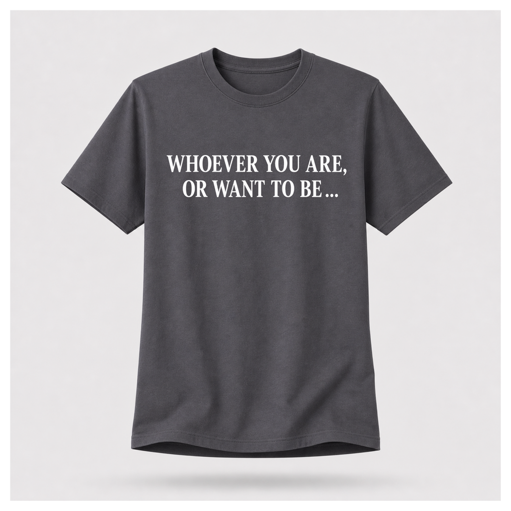 Male model wearing a charcoal grey Politics Is Interested In You T-shirt with “Whoever you are, or want to be...” printed in distressed white text on the front.