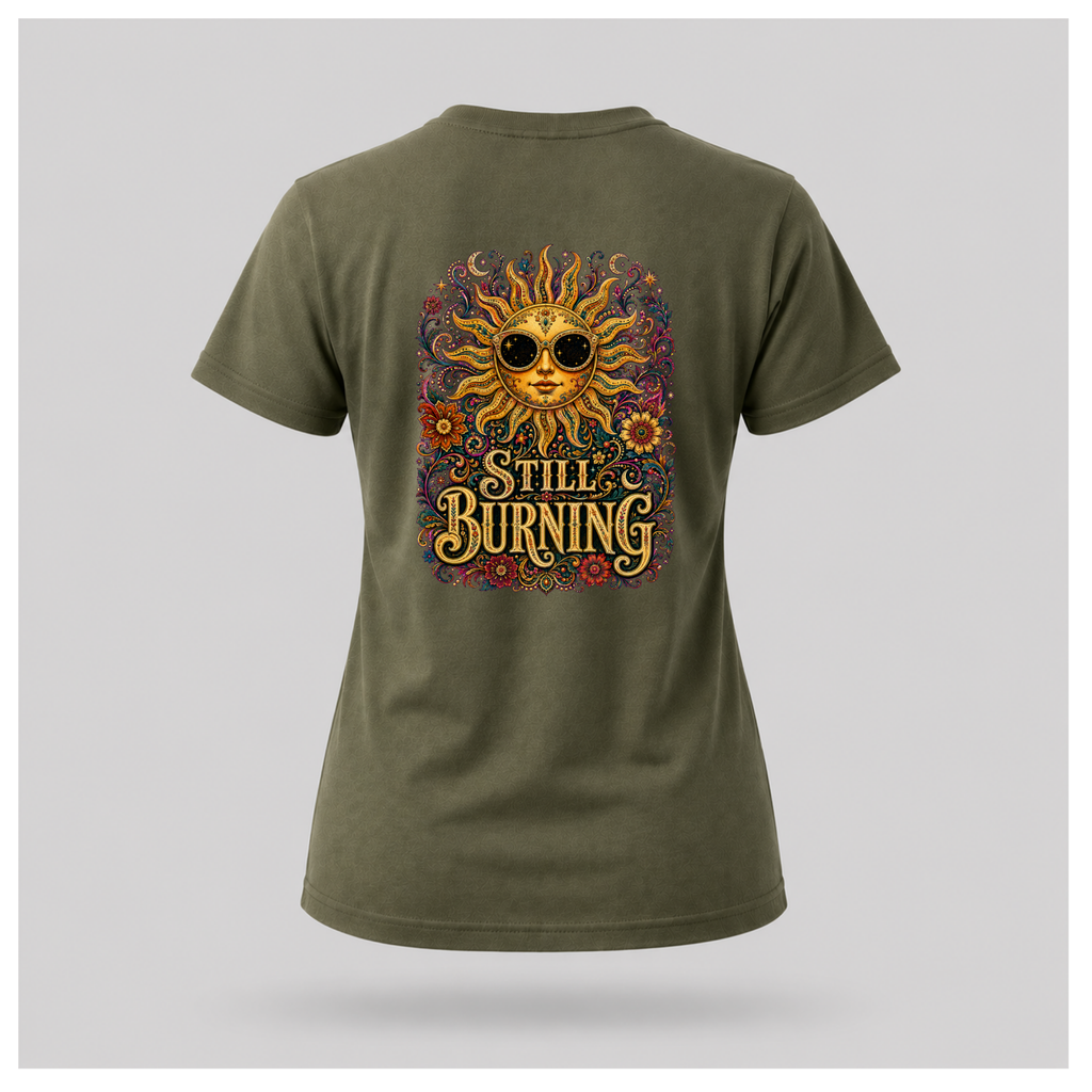 Back of a floating female form wearing the Military Green Still Burning Sun Spirit Tee featuring an ornate celestial sun with floral artwork and the words "Still Burning" by RIOTTEES.