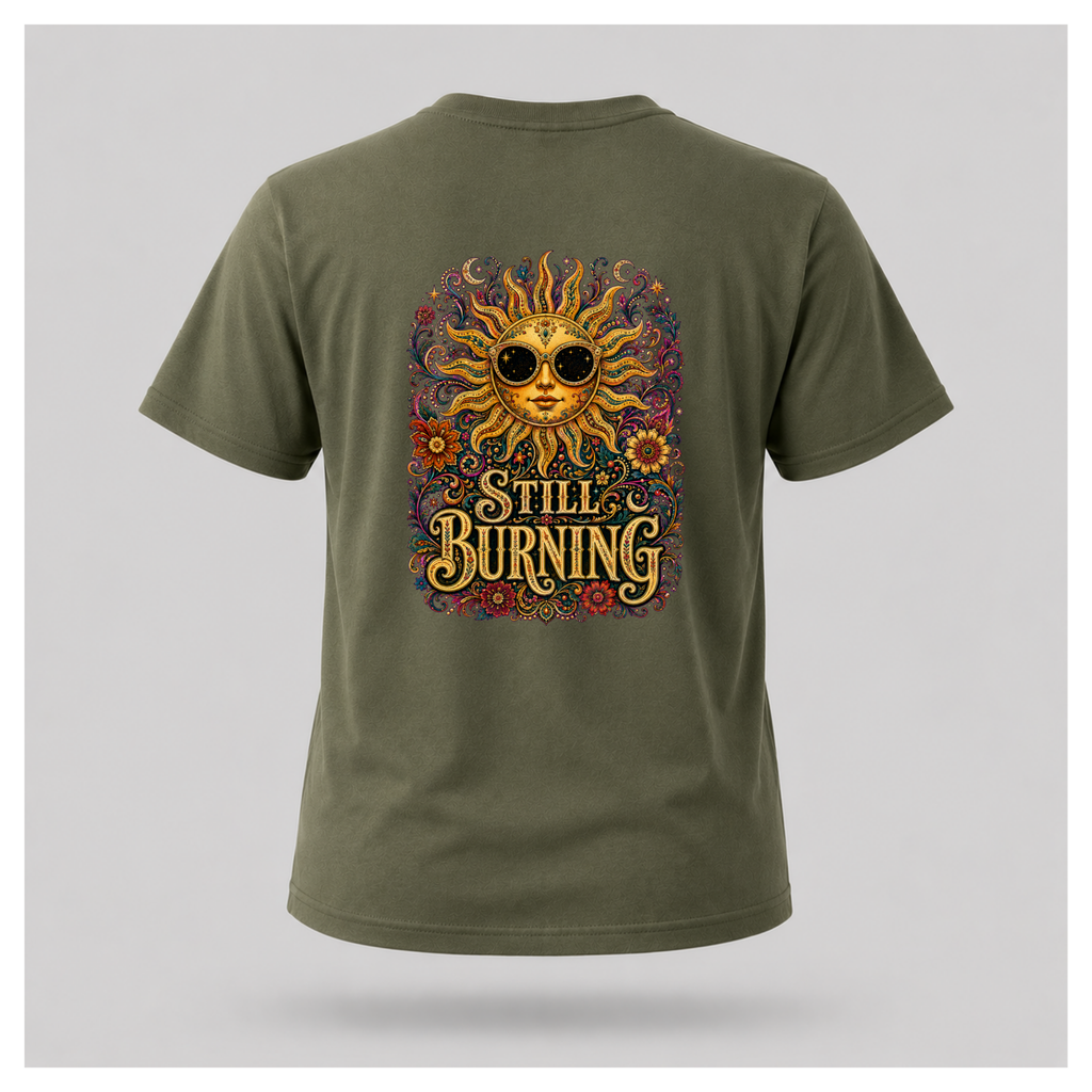 Back of a floating male form wearing the Military Green Still Burning Sun Spirit Tee featuring an ornate celestial sun with floral artwork and the words "Still Burning" by RIOTTEES.