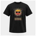 Floating male form wearing the Black Still Burning Sunset Prism Gildan 5000 T-shirt featuring the vintage sunset face wearing sunglasses graphic with Still Burning typography by RIOTTEES.