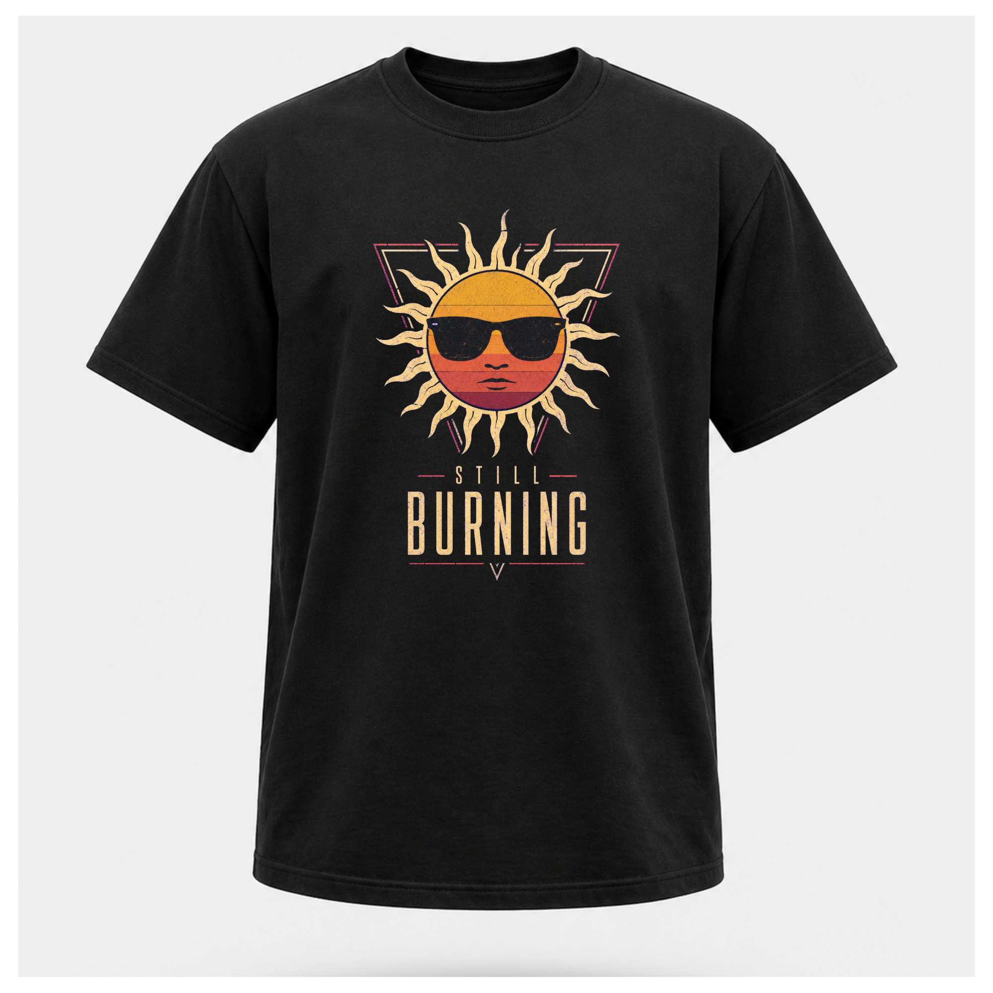 Floating male form wearing the Black Still Burning Sunset Prism Gildan 5000 T-shirt featuring the vintage sunset face wearing sunglasses graphic with Still Burning typography by RIOTTEES.