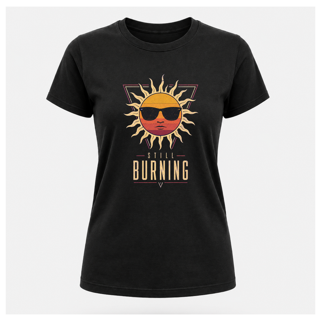 Floating female form wearing the Black Still Burning Sunset Prism Gildan 5000 T-shirt featuring the vintage sunset face wearing sunglasses graphic with Still Burning typography by RIOTTEES.