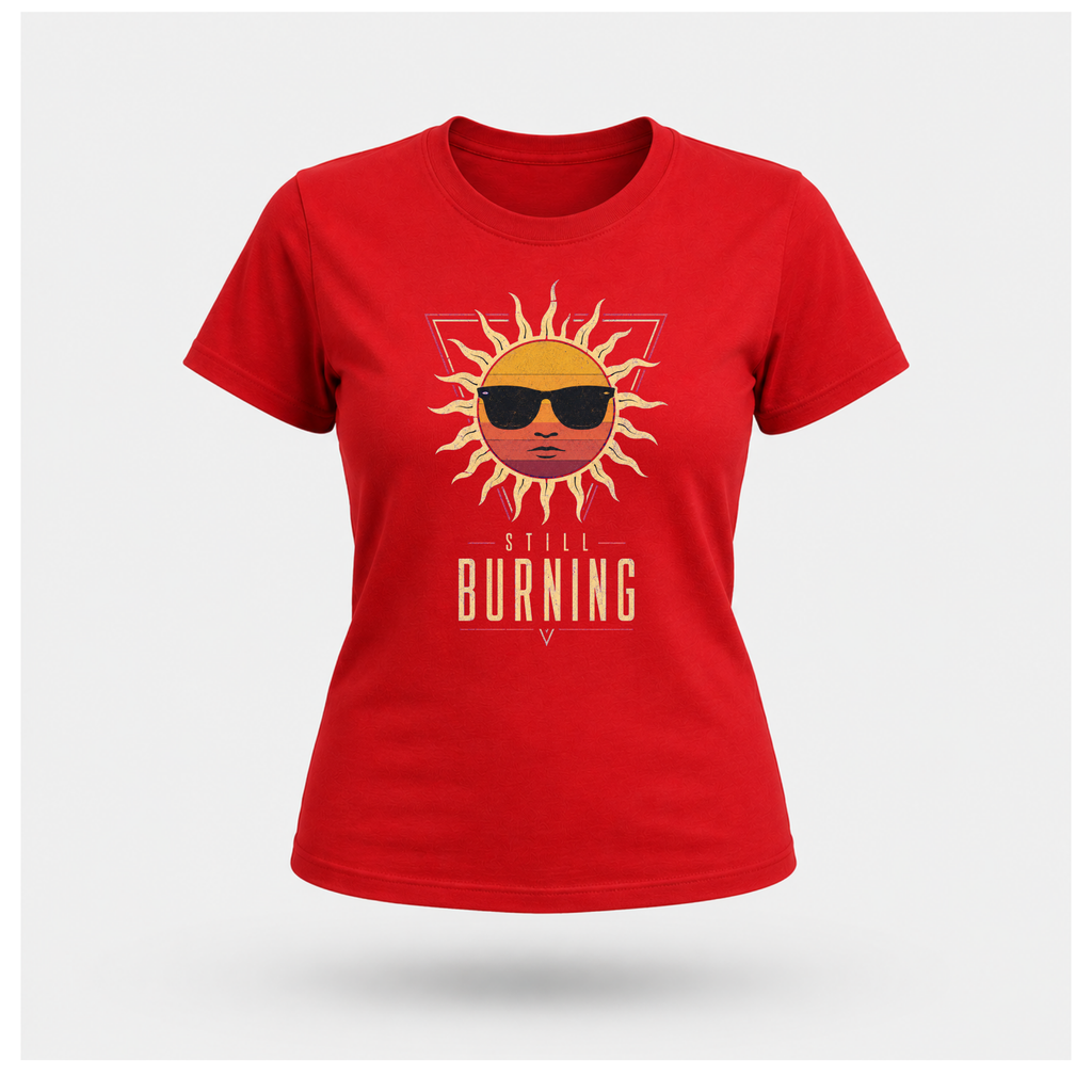 Floating female form wearing the Red Still Burning Sunset Prism Gildan 5000 T-shirt featuring the vintage sunset face wearing sunglasses graphic with Still Burning typography by RIOTTEES.