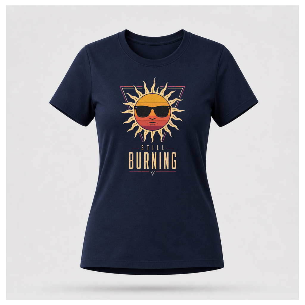 Floating female form wearing the Navy Blue Still Burning Sunset Prism Gildan 5000 T-shirt featuring the vintage sunset face wearing sunglasses graphic with Still Burning typography by RIOTTEES.