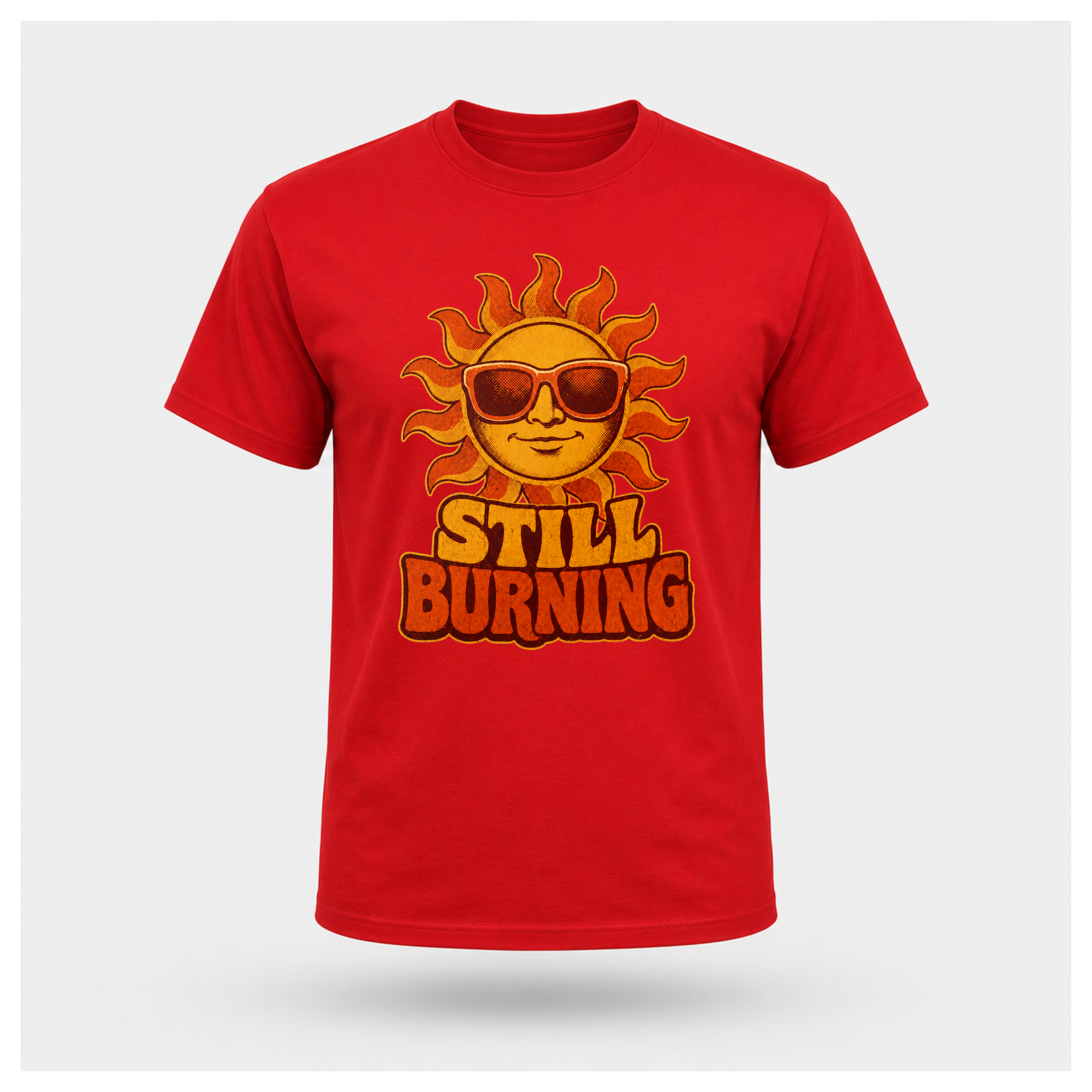Red Still Burning Vintage Tee shown from the front on a floating male form with the Still Burning vintage sun artwork clearly visible, by RIOTTEES.
