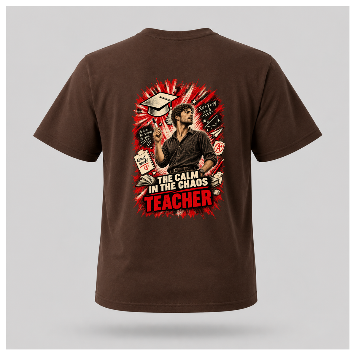Chocolate brown male floating-form T-shirt featuring the large Teacher — Calm in the Chaos back graphic with a male teacher surrounded by illustrated classroom and education symbols.