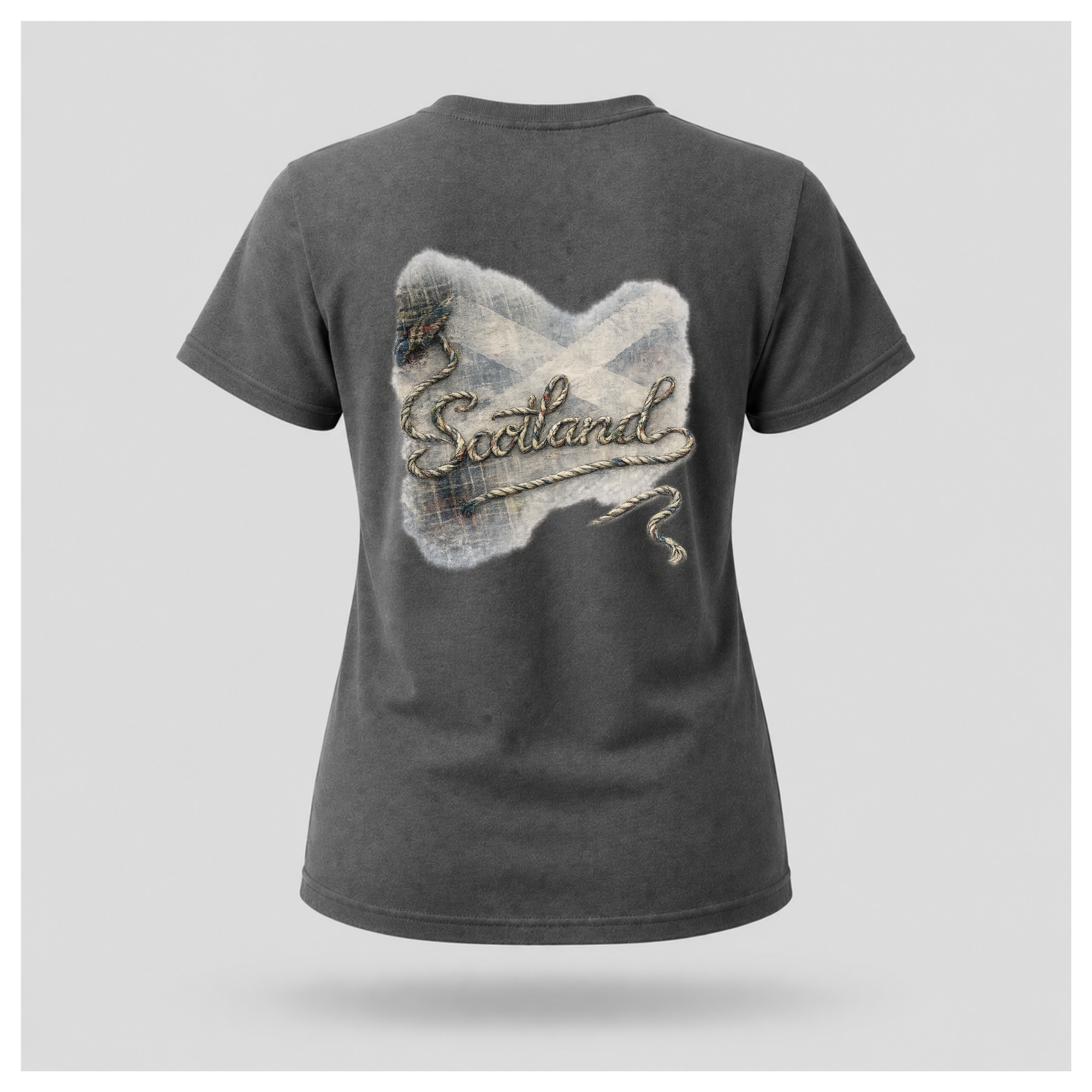 Female Back
Charcoal grey Scottish Yarn t-shirt floating above a peaceful Scottish loch, featuring the women's back design with tartan and woven Scotland artwork by RIOTTEES