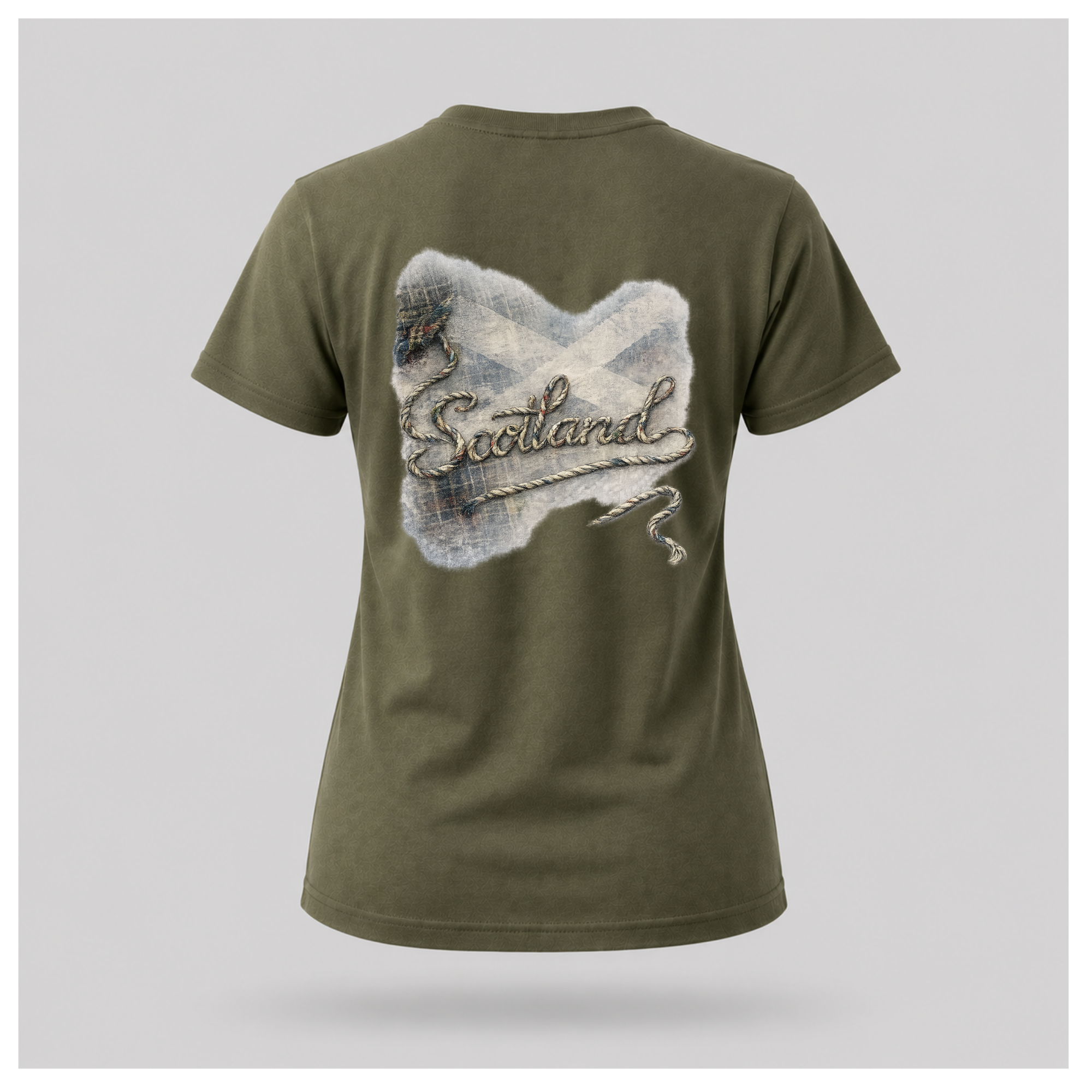 Female Back
Military green Scottish Yarn t-shirt floating above a peaceful Scottish loch, showcasing the women's back design inspired by Scottish heritage by RIOTTEES.