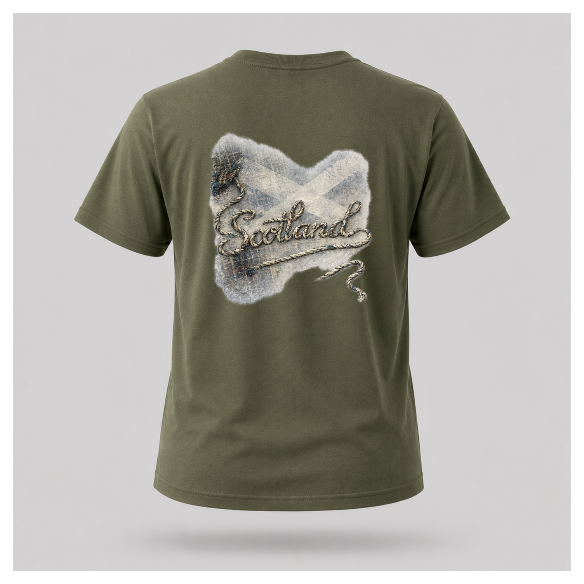 Male Back
Military green Scottish Yarn t-shirt floating over a quiet Highland loch, displaying the back design inspired by Scottish landscapes and storytelling by RIOTTEES.