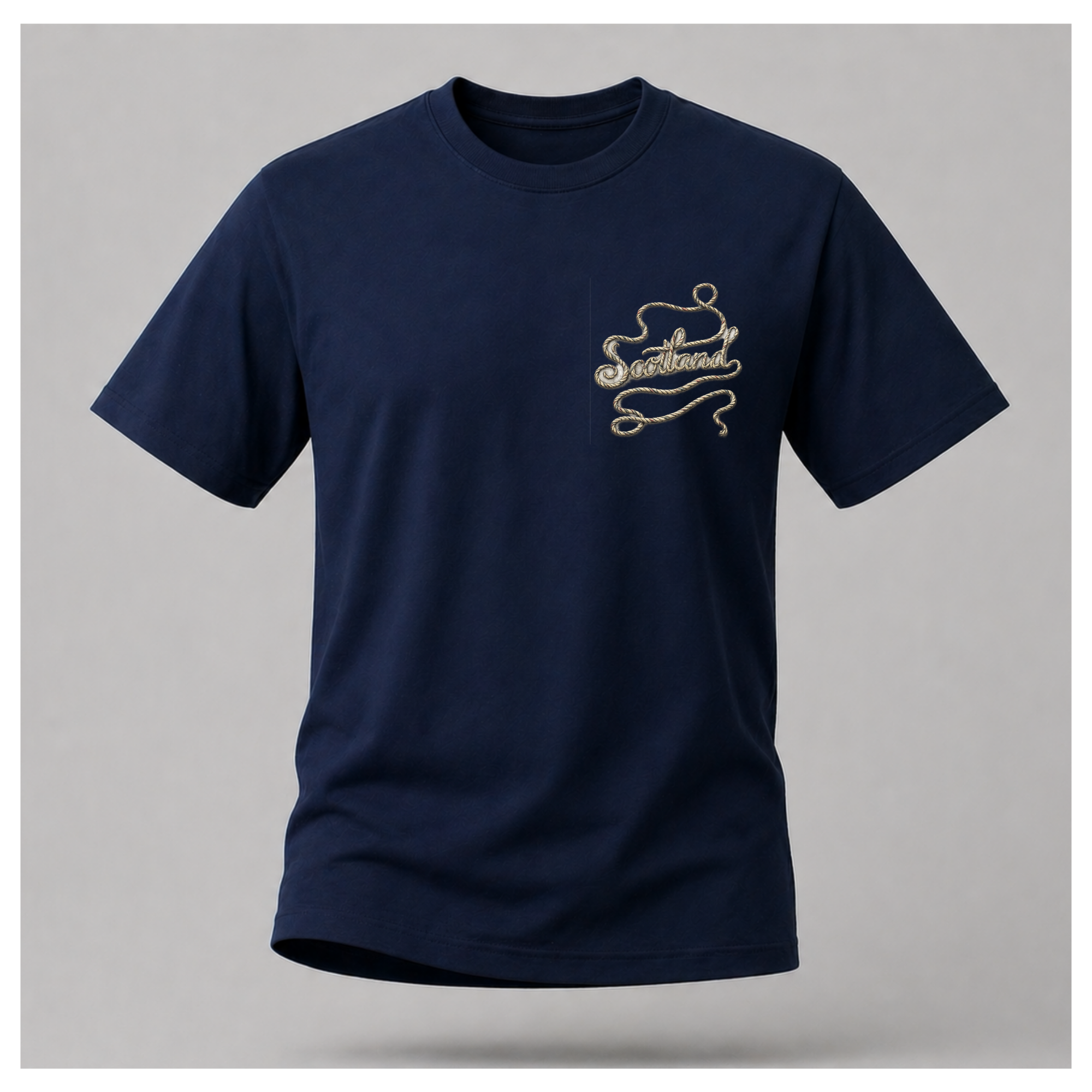 Male Front
Navy blue Scottish Yarn t-shirt floating over a calm Highland loch, showcasing the clean front design of the Scottish Yarn collection by RIOTTEES.