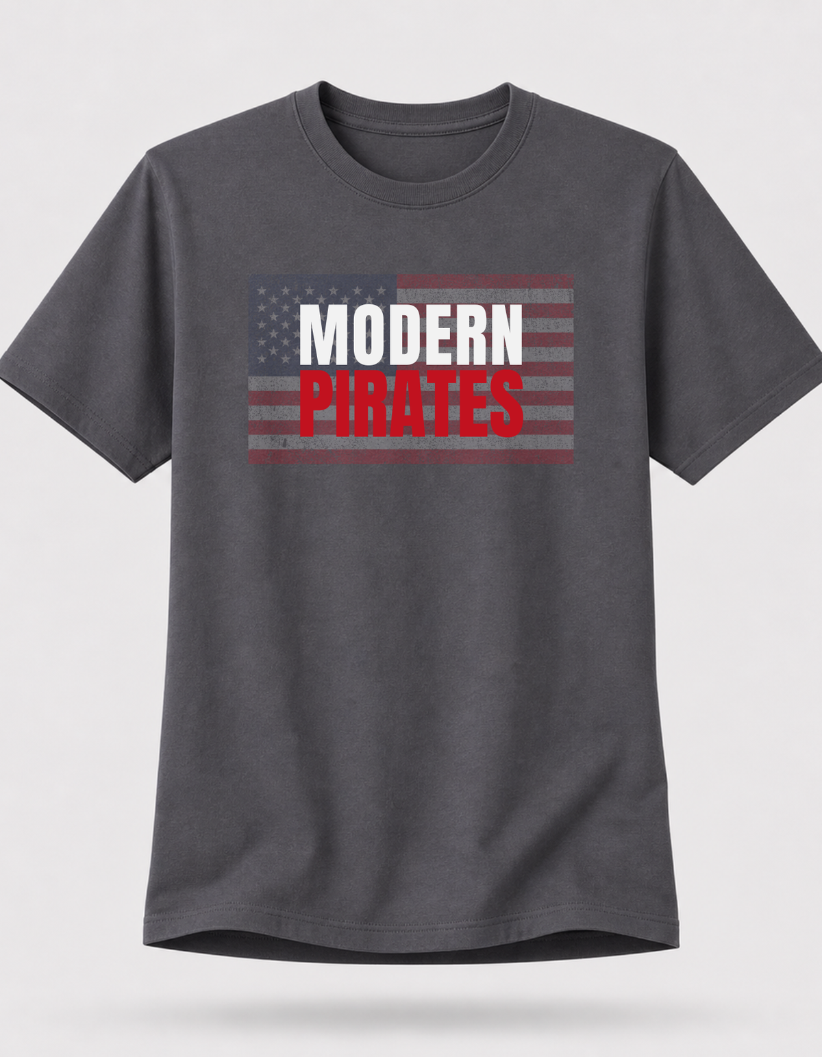 Charcoal USA Modern Pirates graphic T-shirt by RIOTTEES, male floating tee showing distressed American flag and MODERN PIRATES front design.