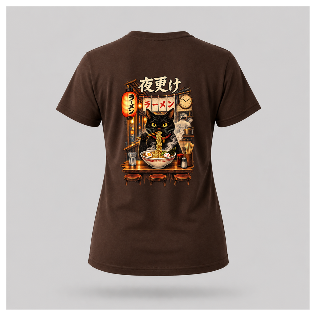 Female floating form wearing a chocolate brown Yofuke Ramen Cat graphic T-shirt, showing the large Japanese-inspired ramen cat back design by RIOTTEES.